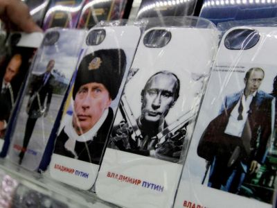 Мобильники с портретами В.Путина. Фото: www.handelsblatt.com
