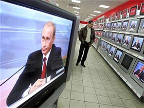 Путин в телевизоре. Фото  с сайта news.softodrom.ru